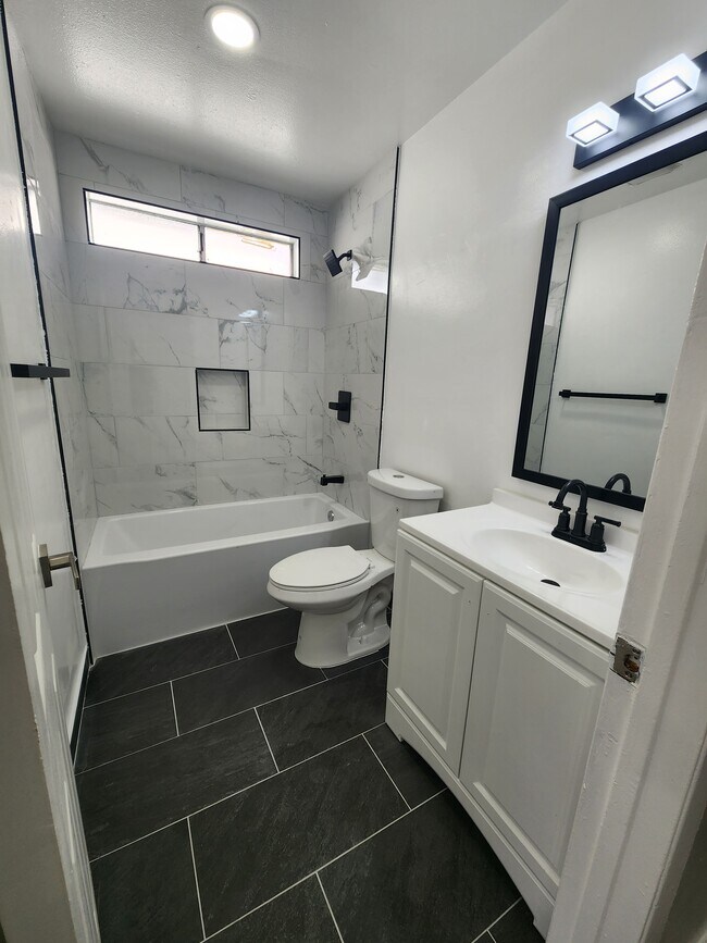 Building Photo - 1450 W 146th St