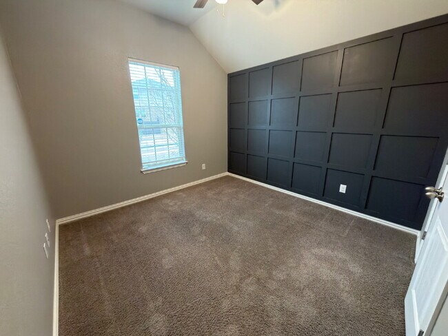 Building Photo - Four bed two bath on a corner lot with a pool in Sunfield. Gas cook top, double ovens. Open kitch...