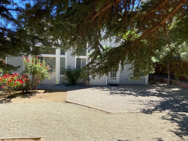 Building Photo - Coming Up Roses - NW Reno 4 Bedroom/3 Car Garage Single Story House