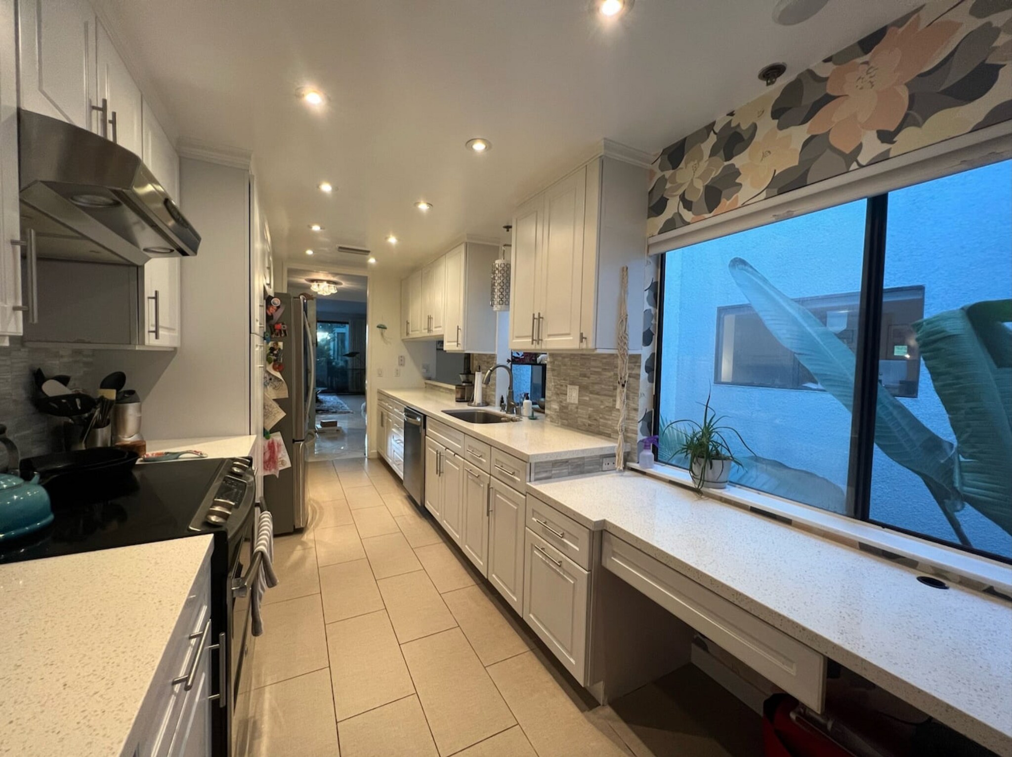 neighbors the kitchen with a window in to the atrium. - 311 Bora Bora Way