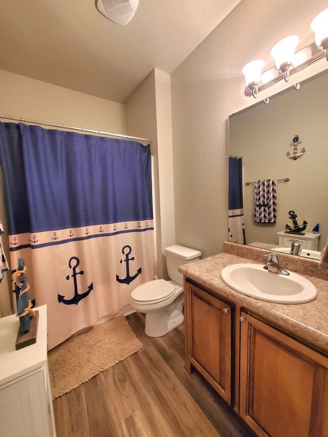 Building Photo - Spacious Open-Concept Home with New Fenced Backyard