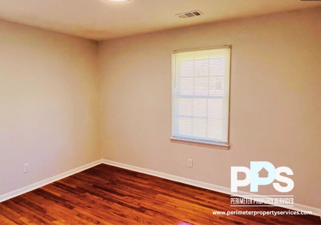 Building Photo - 6127-6129 E Fayetteville Dr