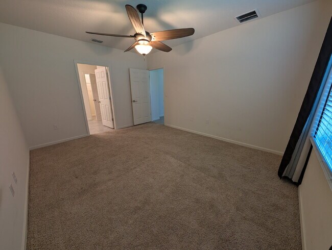 Building Photo - Modern 4-Bedroom Home with Large Backyard in Quiet SW Palm Bay – Available Mid-June