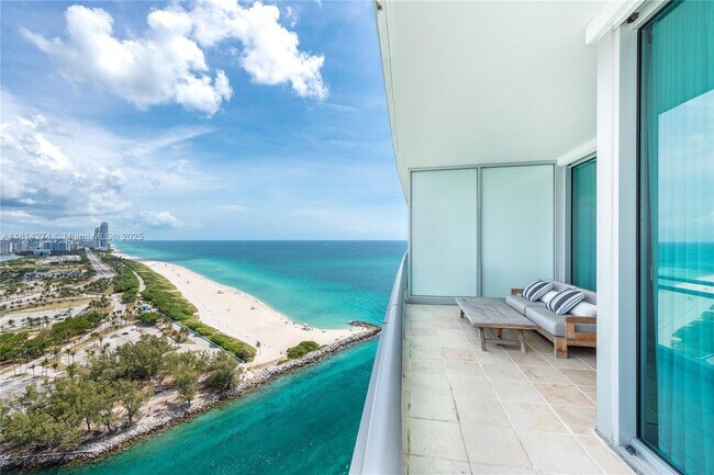 Building Photo - 10295 Collins Ave