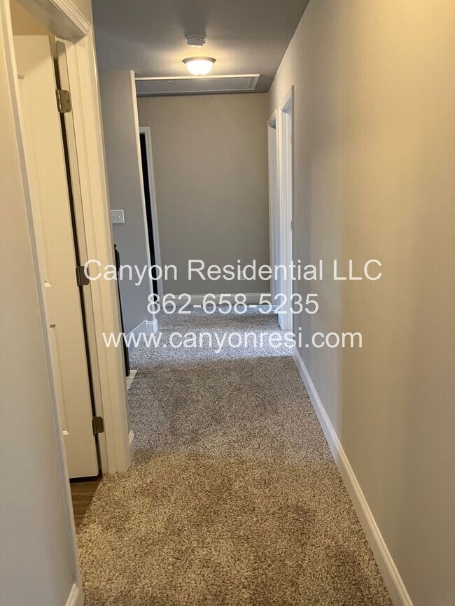 Building Photo - Welcome to this spacious 4-bedroom, 2.5-bathroom !