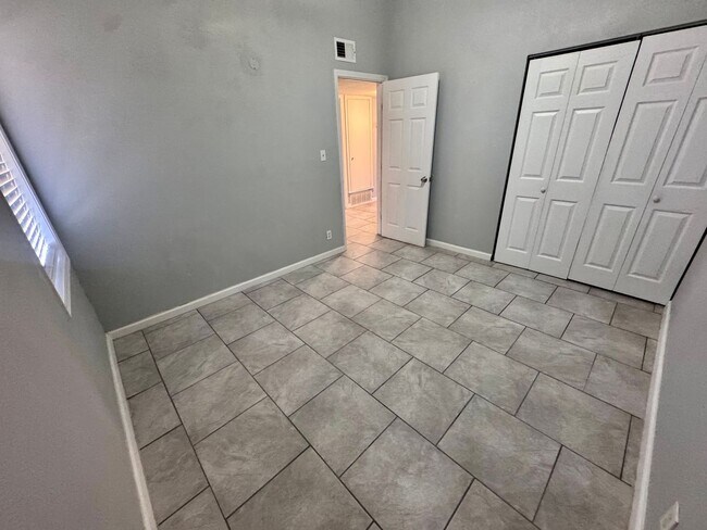 Building Photo - Charming 3-bedroom, 1-bath home featuring an attached carport and a fully fenced backyard—perfect...