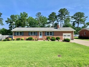 Building Photo - Charming Updated Home, Quiet Street Near Base, Fenced Yard!