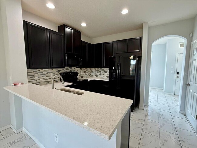 Building Photo - 7011 White Treetop Pl