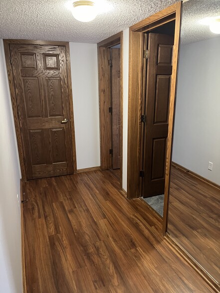hallway between bedrooms and door to laundry - 1300 G St