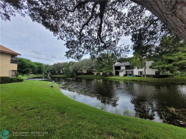 Building Photo - 3733 Cocoplum Cir