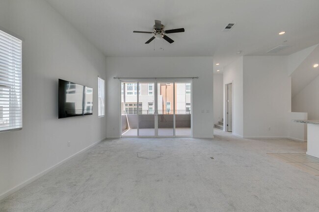 Building Photo - Stunning 4-Level Townhome in Inspirada | R...
