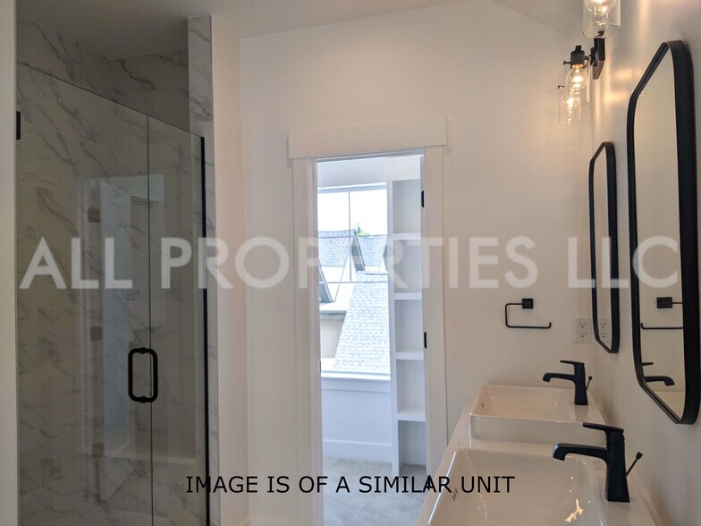 Building Photo - 8059 W 52nd Dr