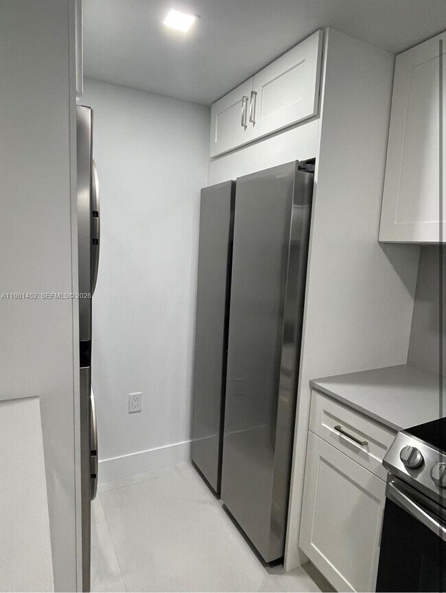 Building Photo - 10275 Collins Ave