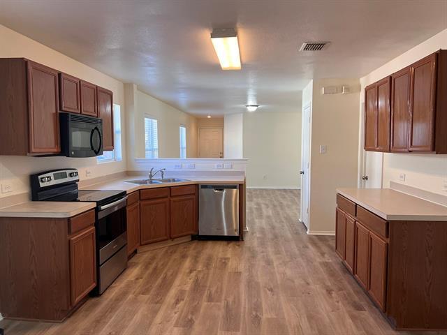 Building Photo - 8911 Valley River Dr