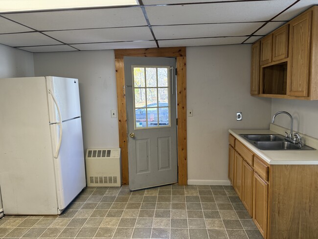 Kitchen back door to deck & parking - 22 N Maple Ave