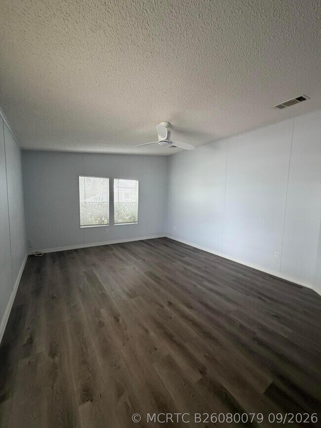 Building Photo - 8179 Sandwedge Terrace
