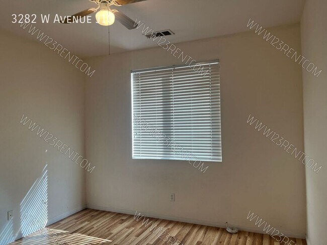 Building Photo - 3282 W Ave J 10