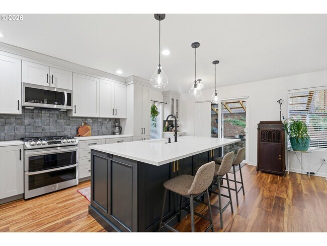 Building Photo - Beautifully Updated 5BR Home with Designer Kitchen, Main-Level Suite & Private Backyard Oasis Nea...