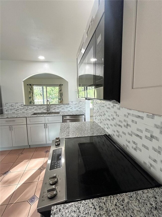 Building Photo - 6452 Royal Palm Beach Blvd