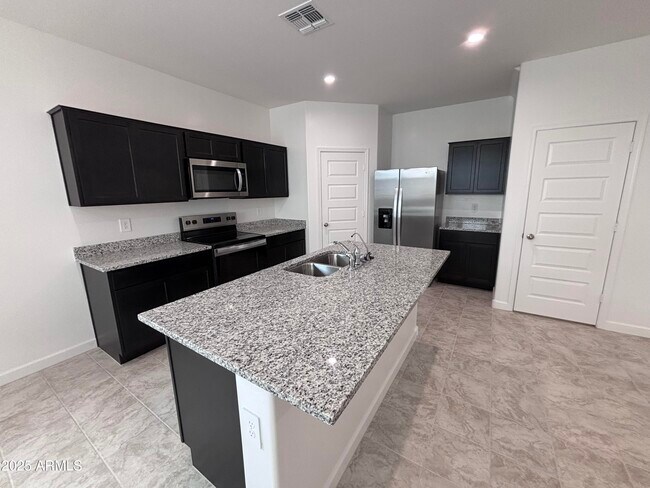 Building Photo - 2055 W Sheridan Ave
