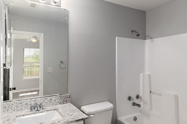 Building Photo - College Station home with stalls and arena on site!