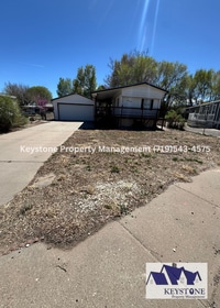 Building Photo - Spacious 2 Bed / 2 Bath Home with Oversized Garage & Updates Throughout $1200/$1200