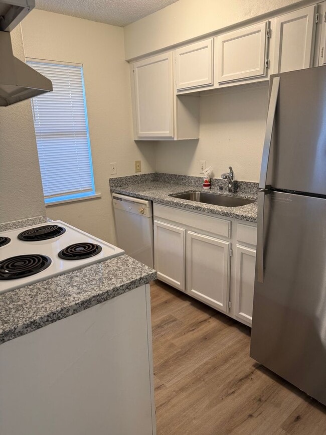 Primary Photo - Move-in ready 1-bedroom, 1-bath condo in a...