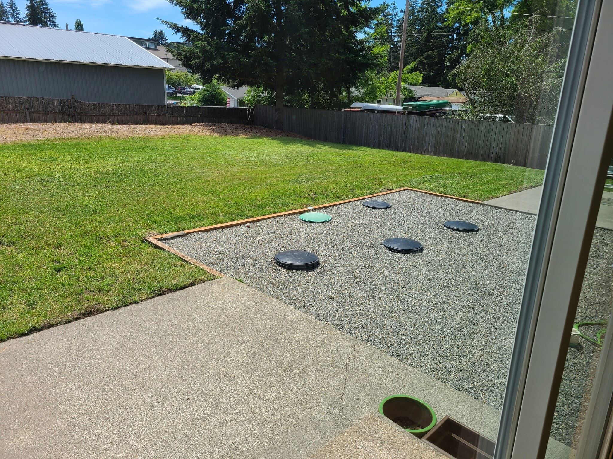 Newly landscaped backyard, fully fenced, divider wall install 7/23 - 246 163rd St S