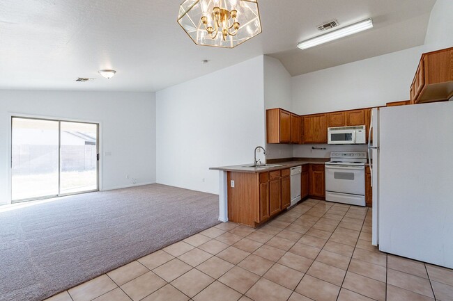 Building Photo - Three bedrooms! Fresh Carpet and Paint!