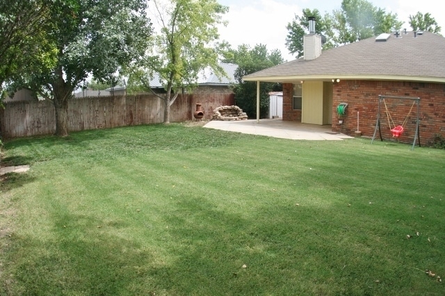 Building Photo - Brick 3 Bedroom Home! Stunning Backyard! M...