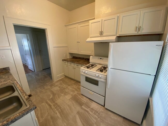 Building Photo - Huge Trinity Park Duplex with Office, Shared Fenced Yard and Adorable Porch!