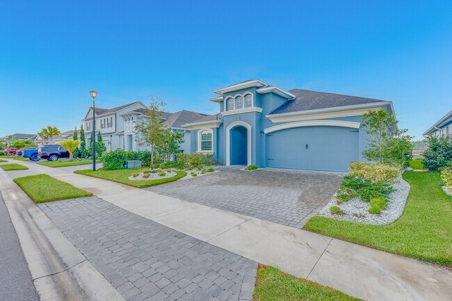 Building Photo - Luxurious Solar Powered 4 Bedroom, 3 Bath Waterfront Home with office & Upgrades Galore!