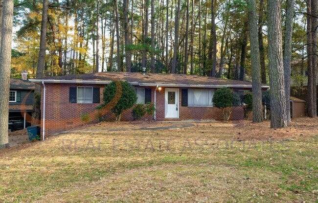 Primary Photo - Charming Brick Ranch on a Spacious, Wooded Lot!