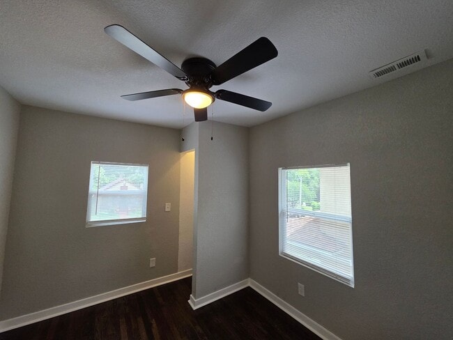 Building Photo - Spacious 4-Bedroom, 2.5-Bath Home with Hardwood Floors