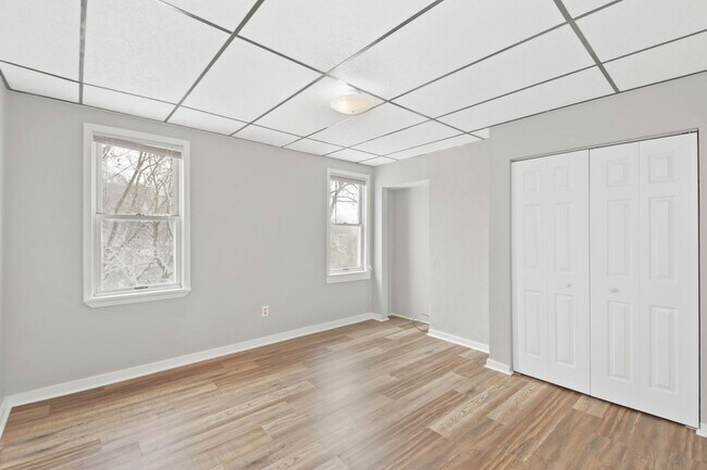 Building Photo - JUST LOWERED! EXPERIENCE THE ULTIMATE SAVI...
