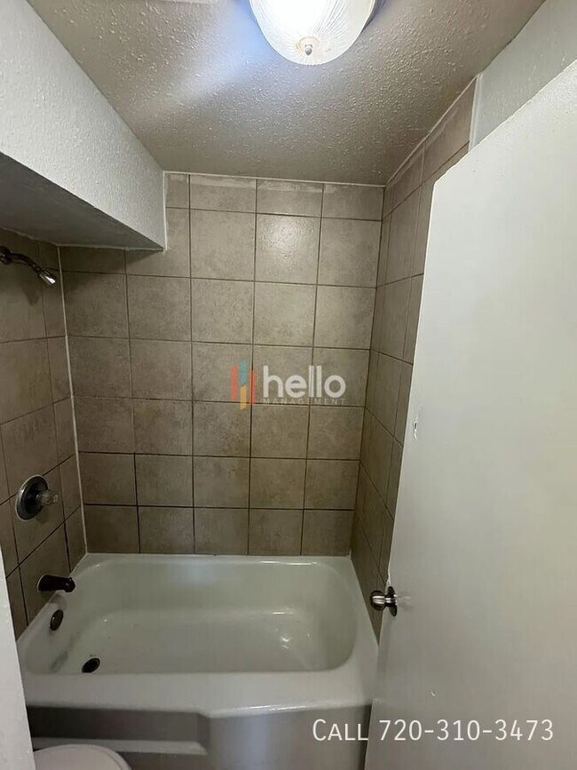 Building Photo - 9504 East 17th-102