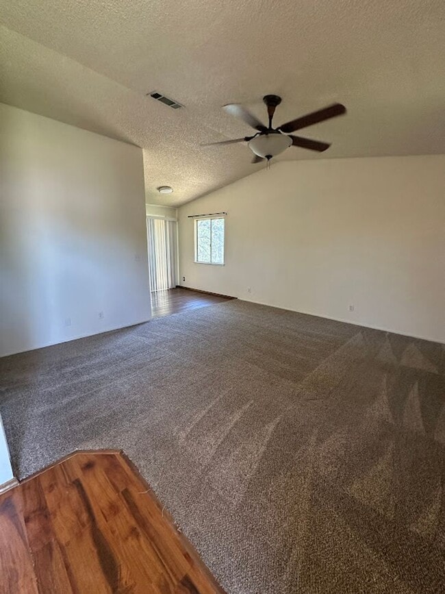 Building Photo - Well maintained home on 1.14 acres - Landscaping included!