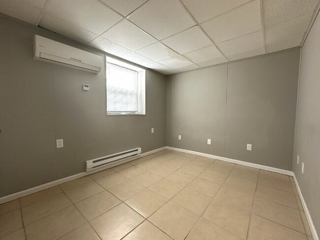 Building Photo - LEASE PENDING! Lower Level Apartment in We...