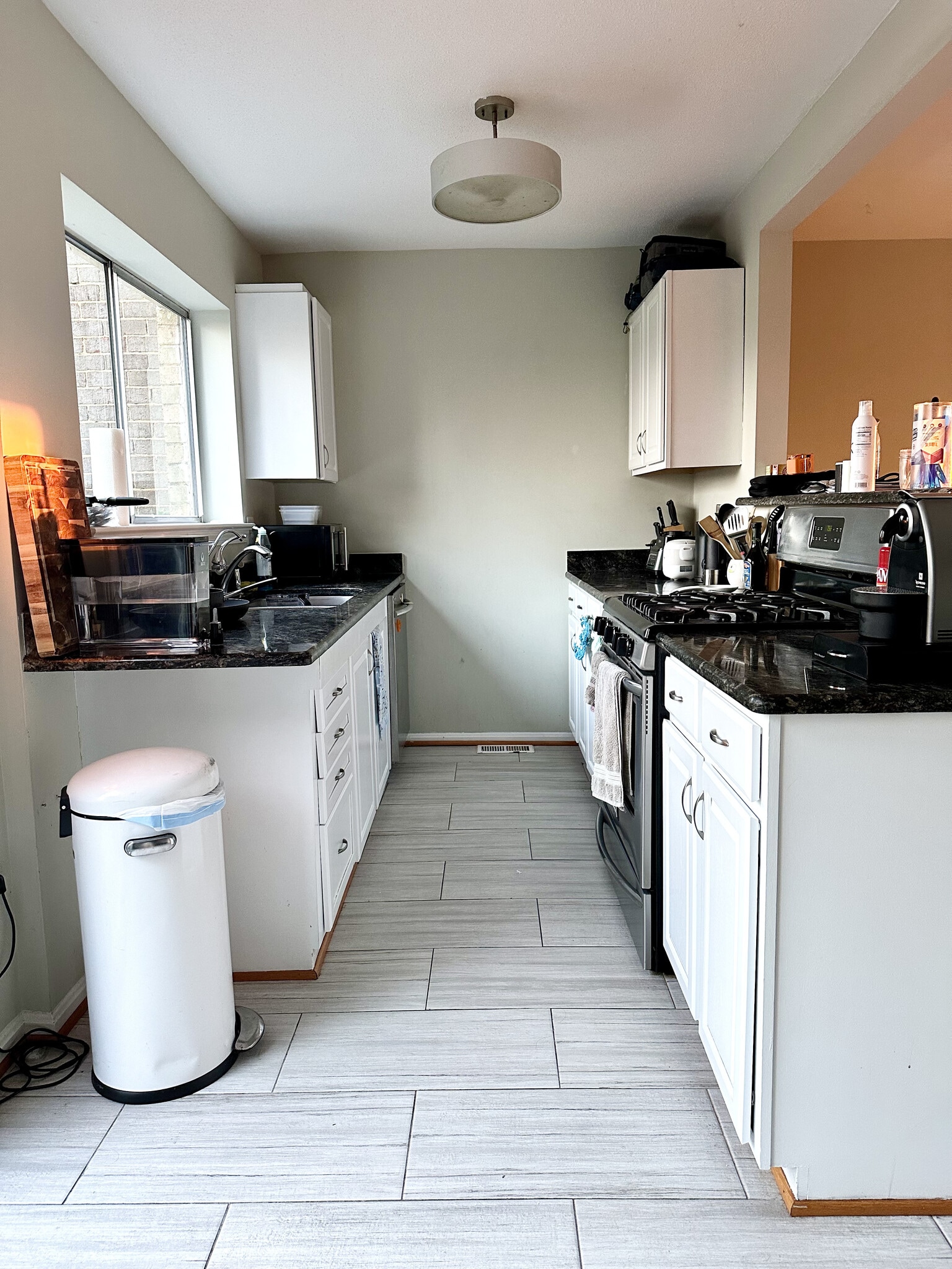 Another view of the kitchen in its current state today showing stainless steel appliances/ - 4767 Kandel Ct