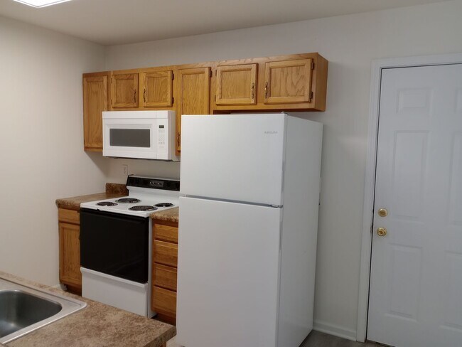 Building Photo - 5013-5015 Carrie Ridge Dr.