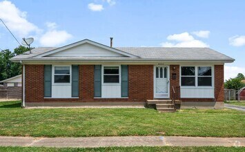 Building Photo - Welcome home to this updated bright and sp...