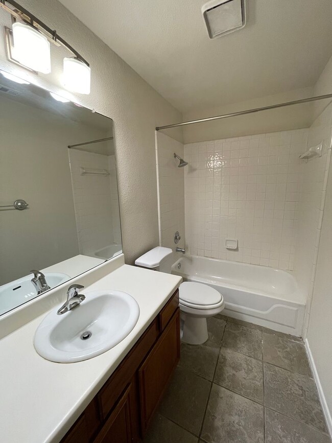 Building Photo - SPACIOUS HOME - NEW FLOORING! - 2 LIVING A...