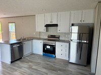 Building Photo - 1000 Pine Tree Cir