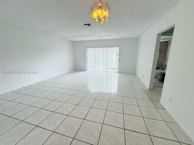 Building Photo - 3100 Coral Springs Dr