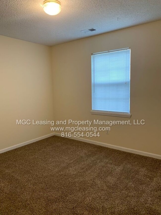 Building Photo - Welcome to Whispering Winds Townhomes – Wh...