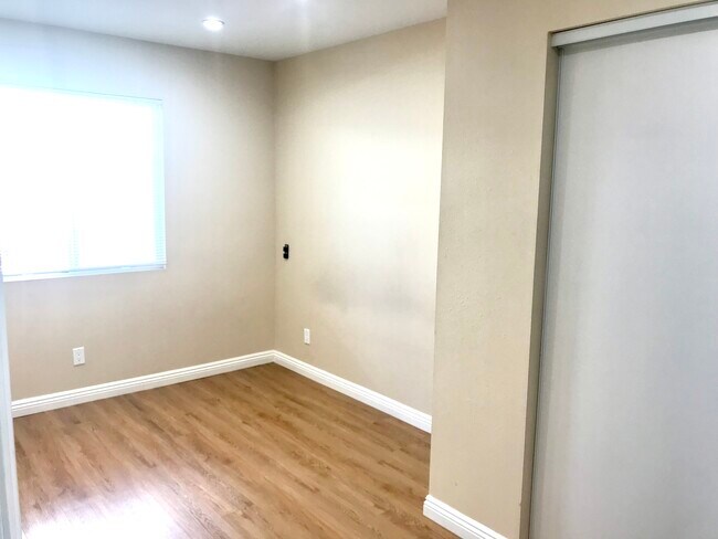 Primary bedroom and closet - 8160 Jamieson Ave