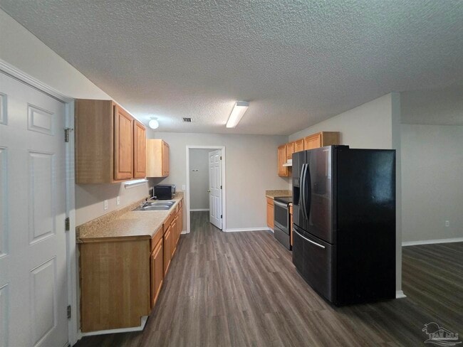 Building Photo - 8660 Figland Ave