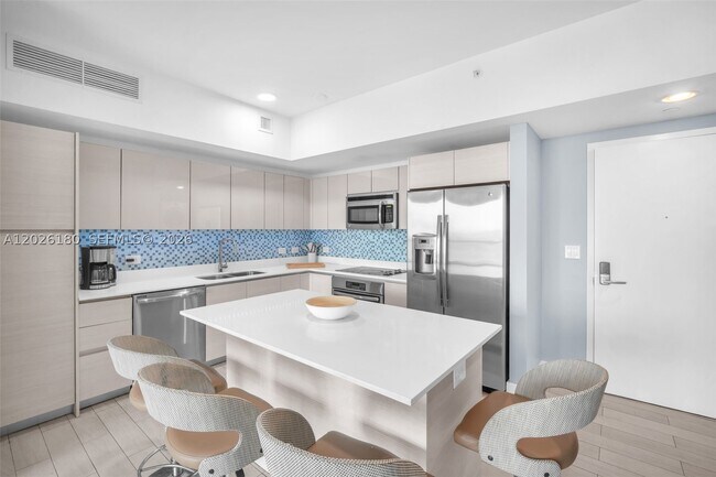 Building Photo - 2602 E HALLADALE T3105