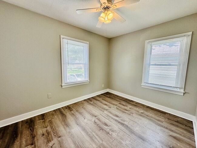 Building Photo - Updated two story home with unfinished bas...
