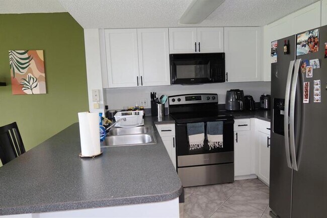 Building Photo - 9470 Tangerine Pl